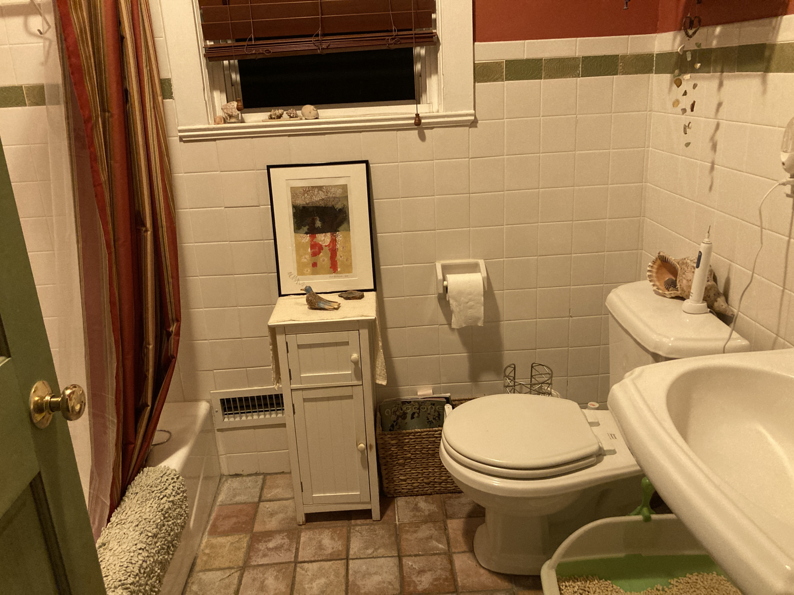 This is the bathroom on the 2nd floor, which includes a tub and a shower. This bathroom is opposite ...