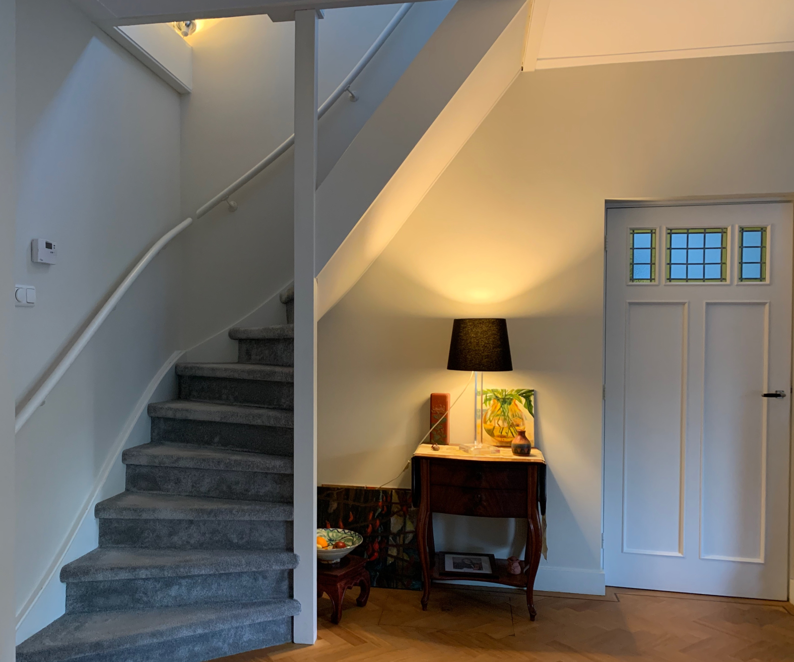 Stairs to the first floor are in the living room.