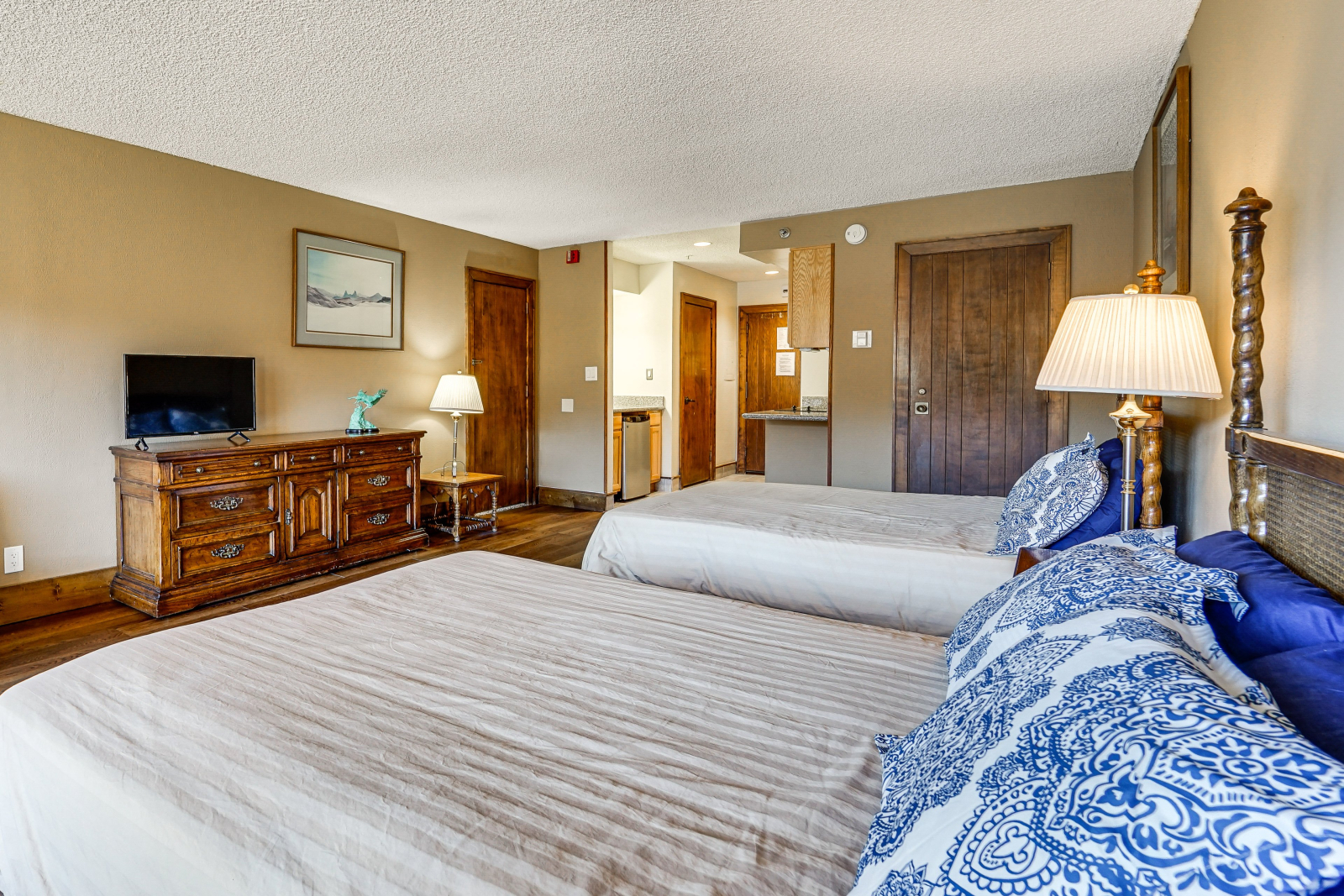 Two comfy queen beds, full futon, two closets, dresser, smart TV with DirecTV, and free WiFi.