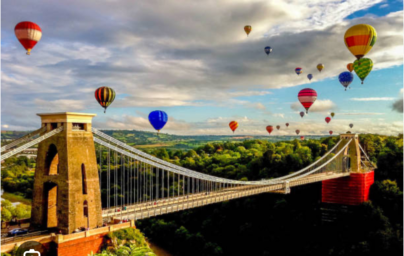 The famous Clifton Suspension bridge in Bristol seen during the Bristol balloon fiesta in august . 4 ...