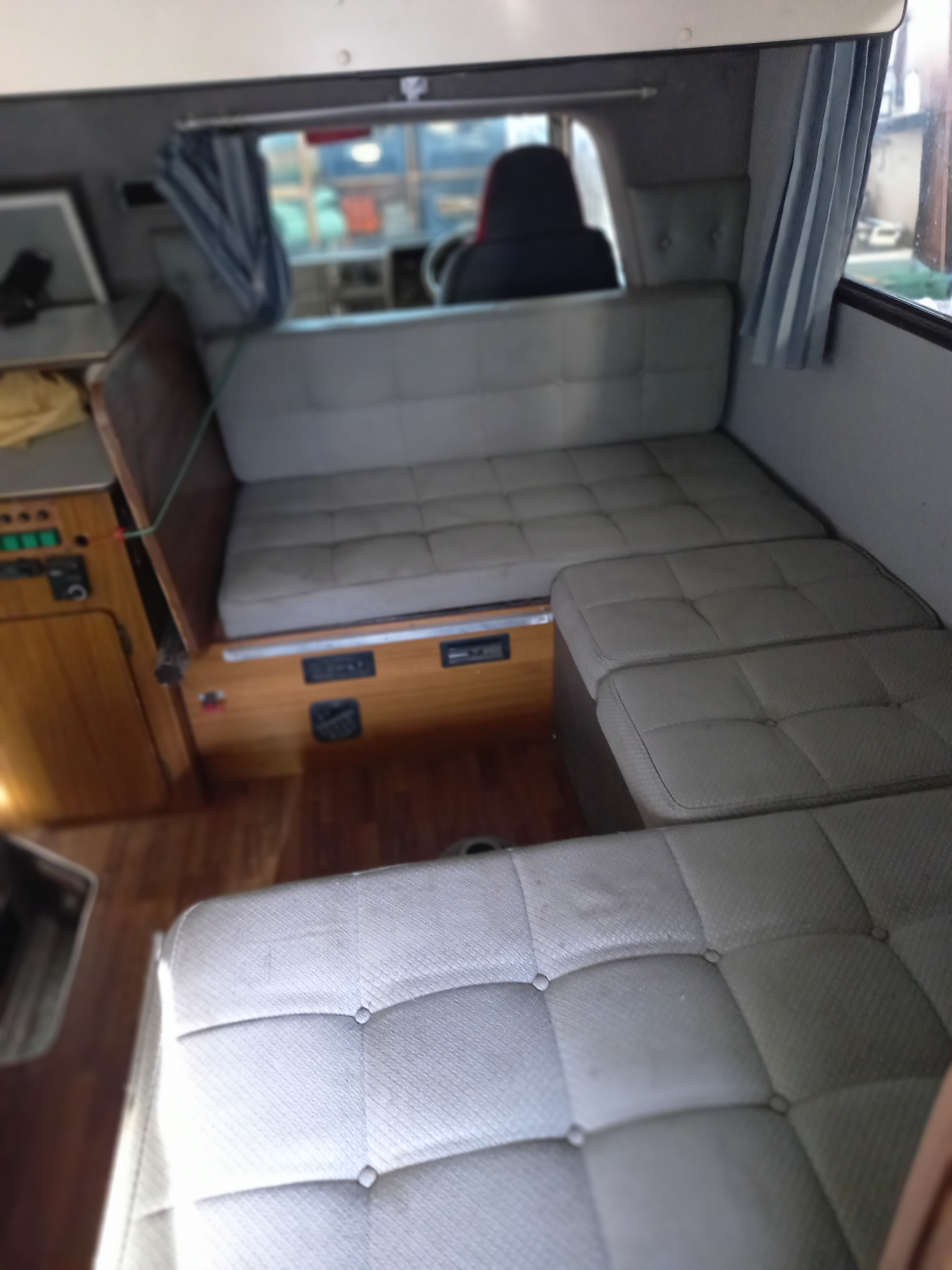 The table and squabs are rearranged to set up the bed. It is an easy system and quite quick. There i ...