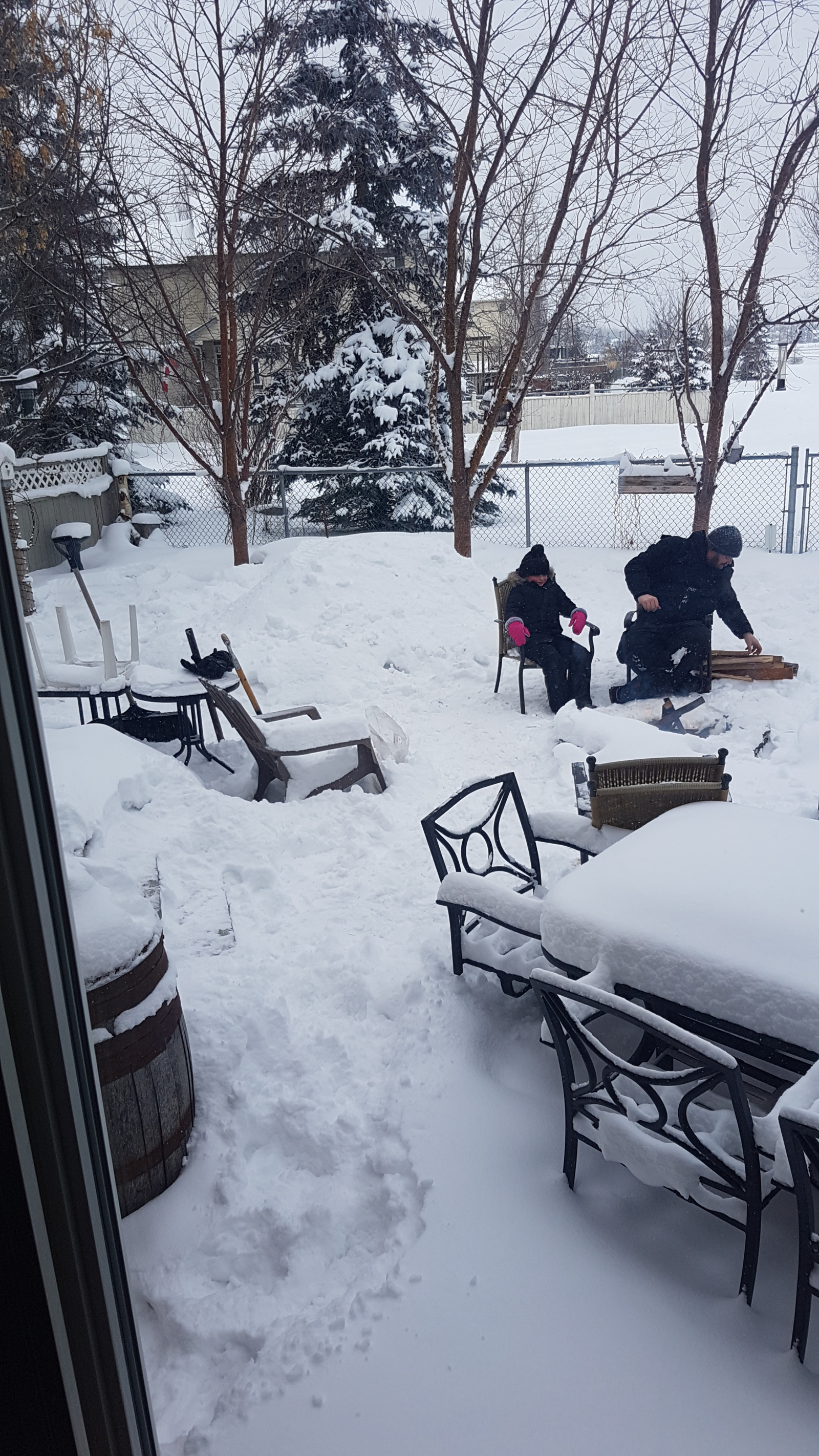 Getting ready to build a winter fire.