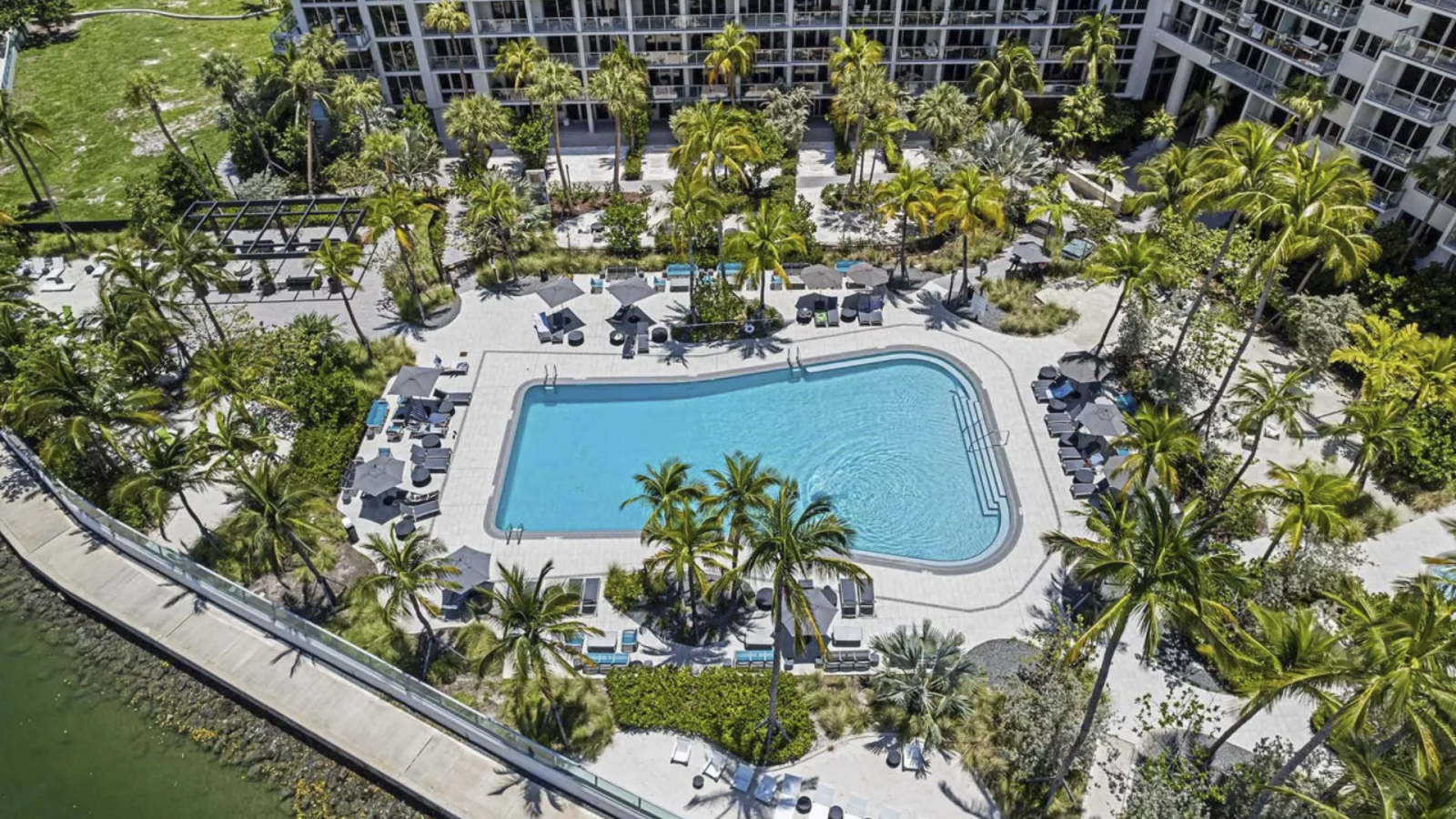 Sunny Artist’s Home in South Beach · Sunrise Balcony & Waterfront Pools