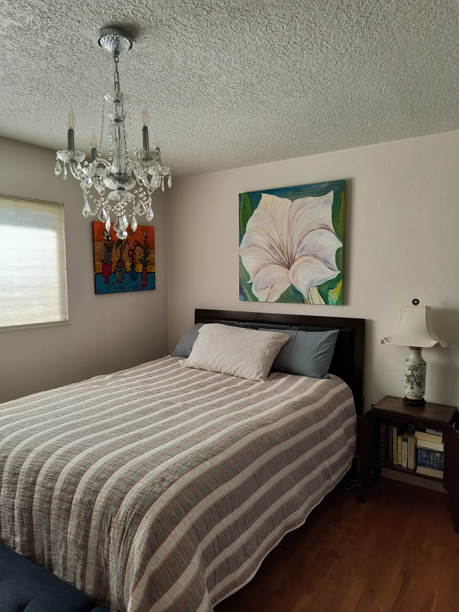 Master bedroom with a queen size mattress
