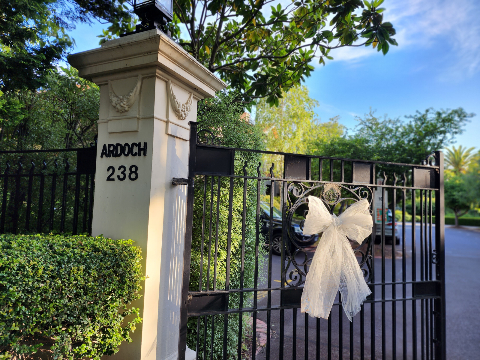 Front entrance gates to Ardoch, an estate of nearly 100 apartments set around a central Village Gree ...