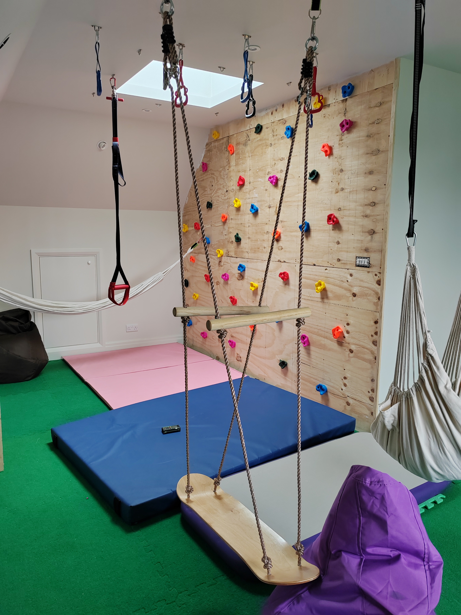 Upstairs play room - swings, climbing wall, monkey bars and hammocks!