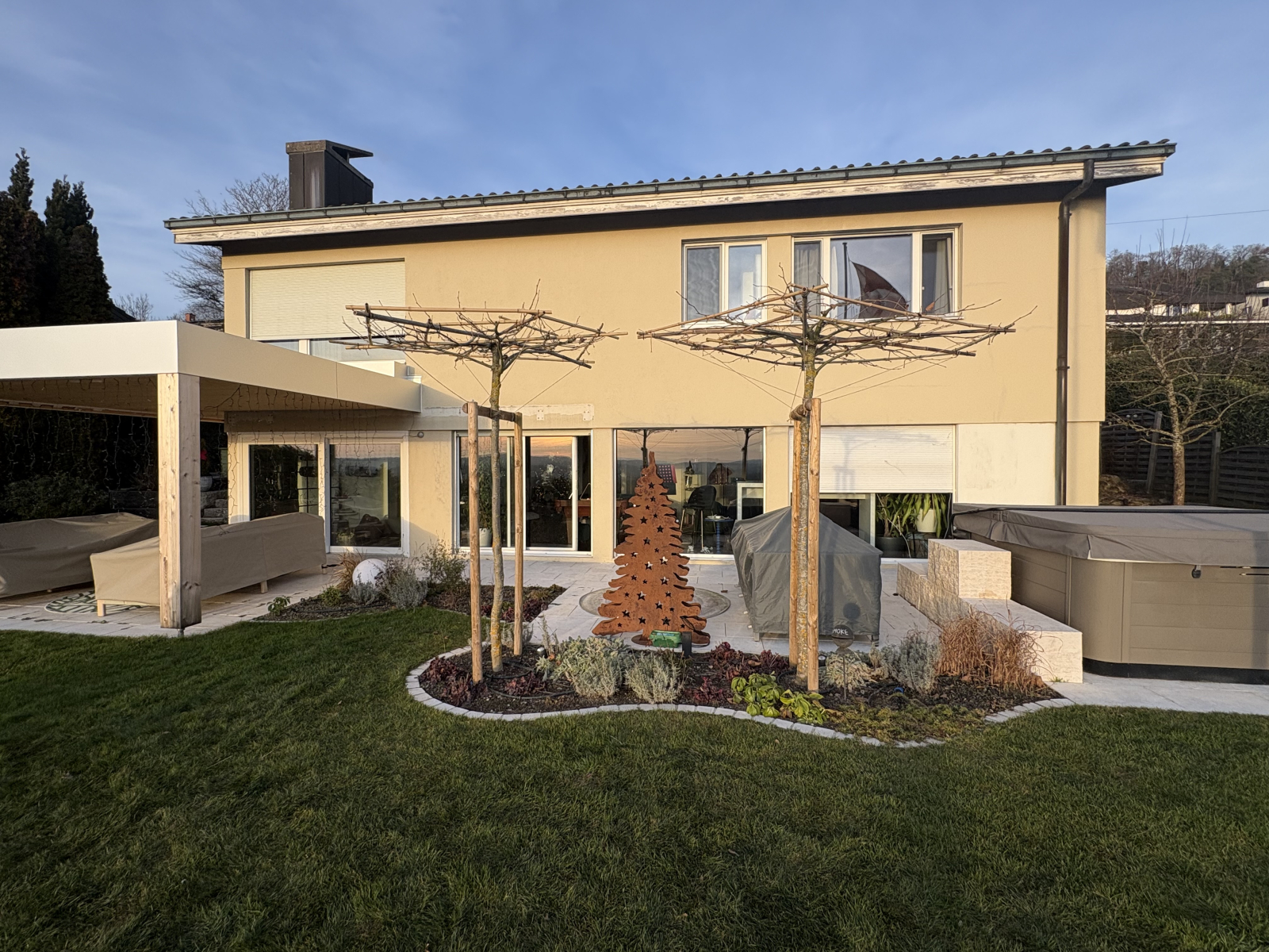 The full house from the garden. The Jacuzzi is a particular favorite of ours