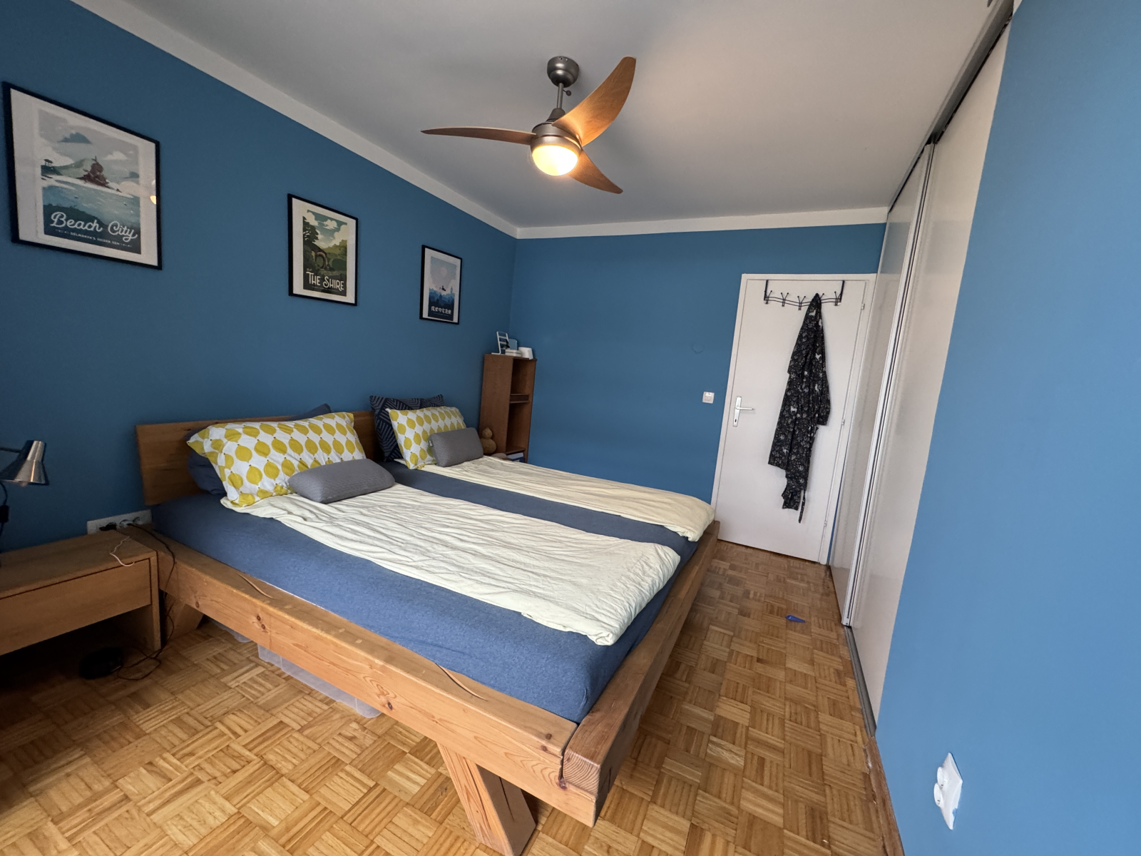 The bedroom features a king sized bed.