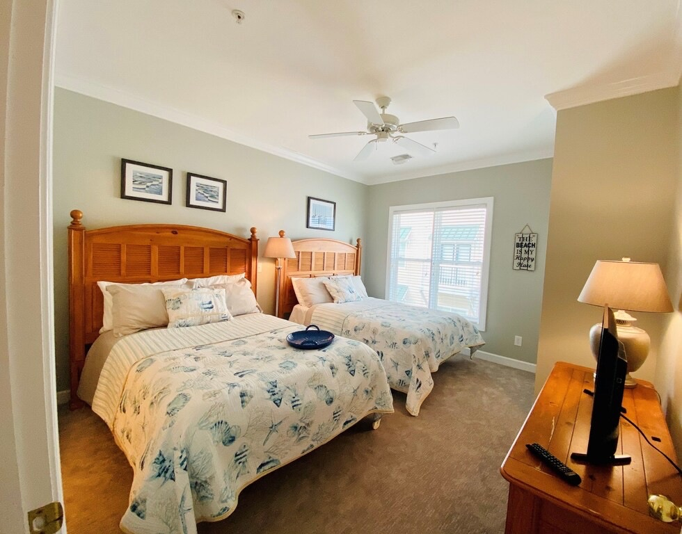 Bedroom two has two double beds.