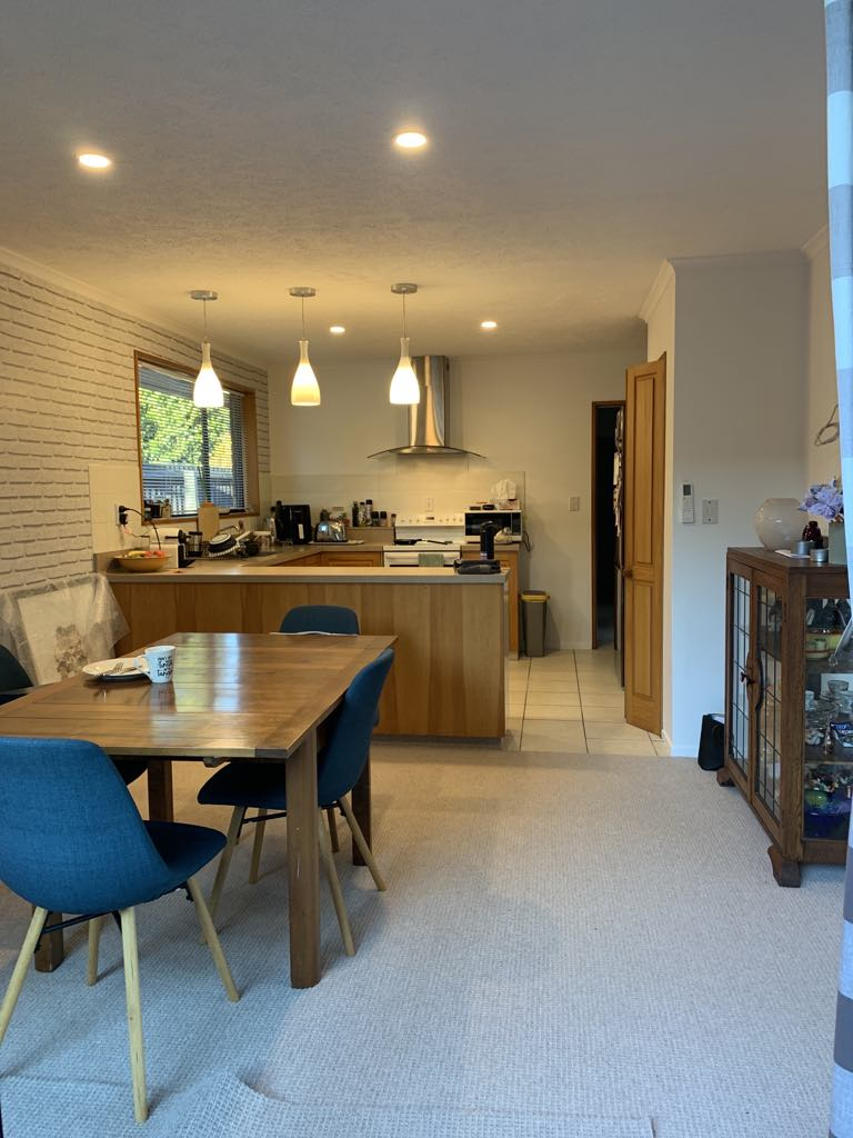 Open plan dining room and kitchen with dishwasher, pod coffee machine, microwave, oven and air fryer ...