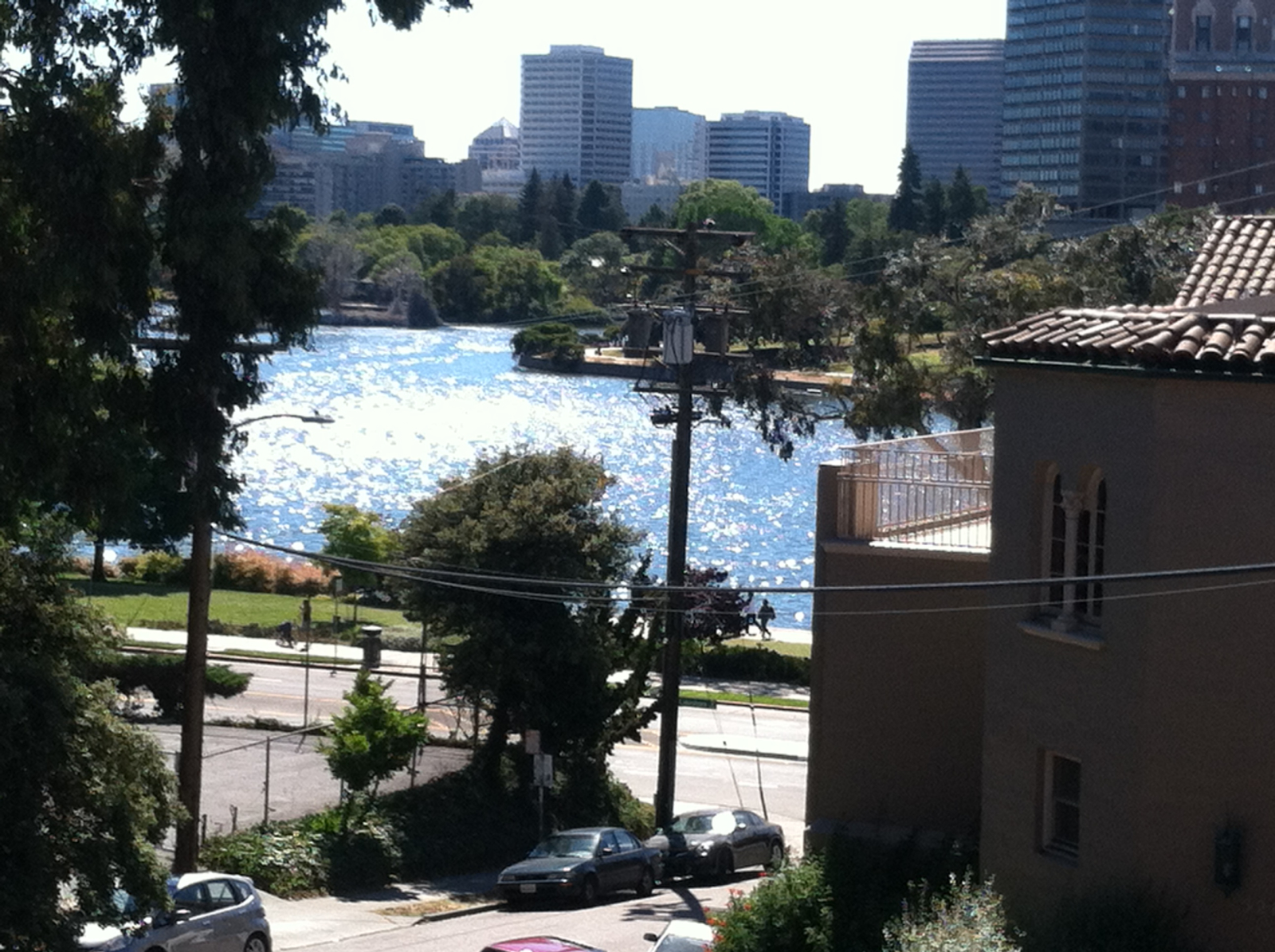 View of glimmering lake from apartment terrace.