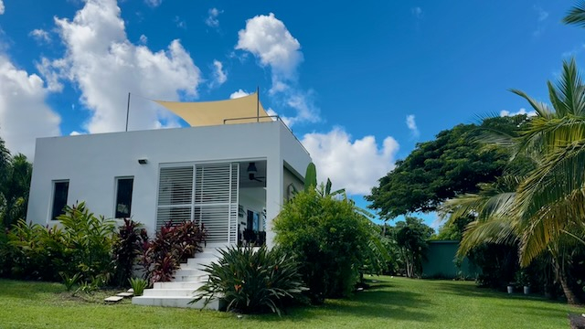Modern, tiny home with plunge pool in lush garden