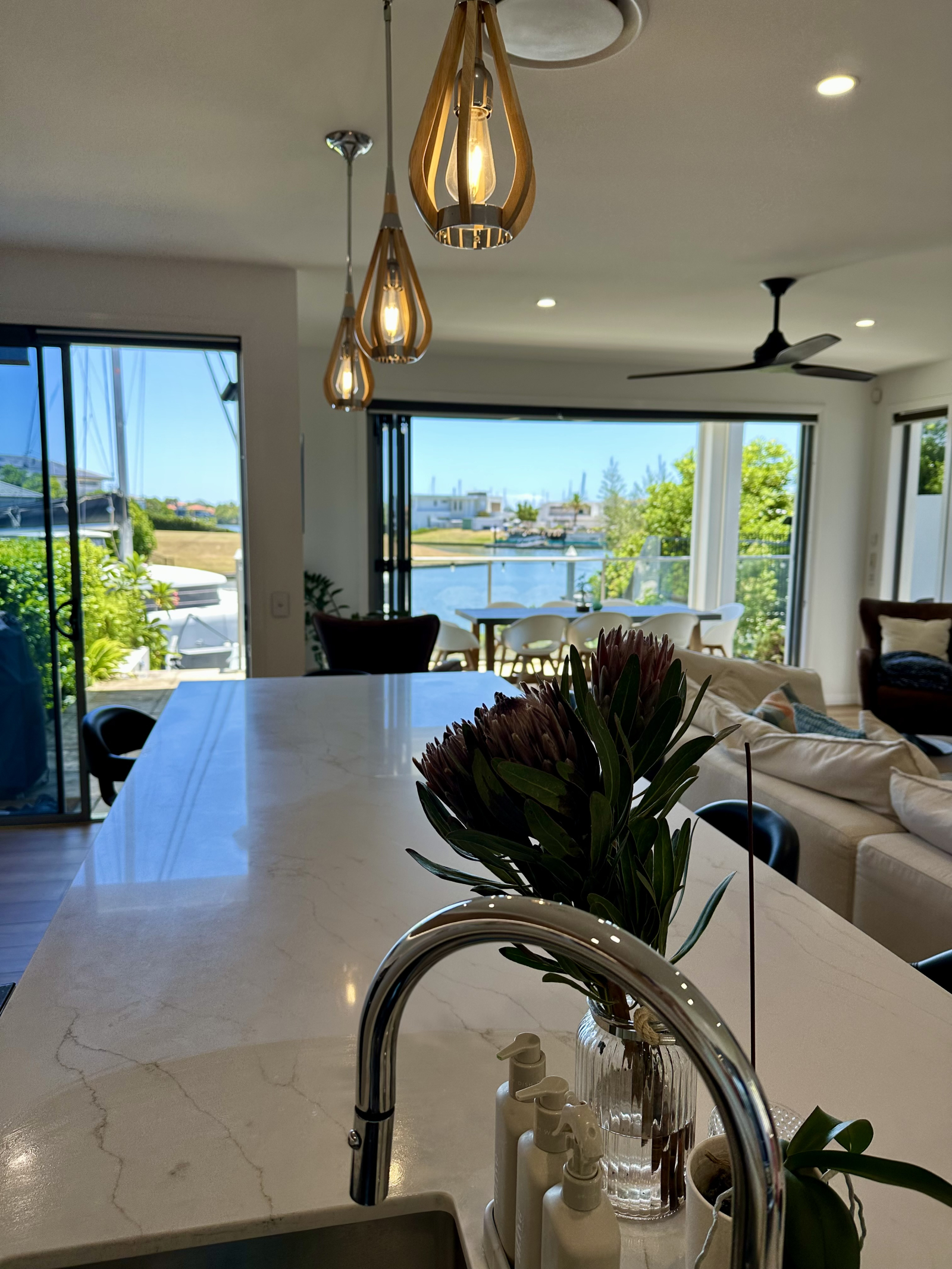 Modern waterfront home in a secure golfing estate.