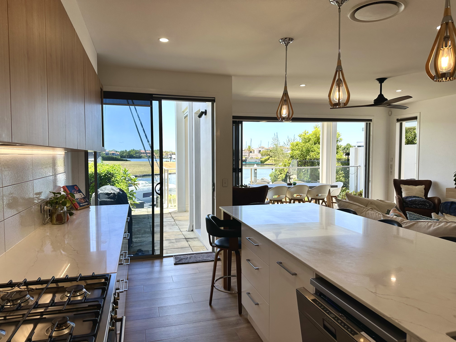 Modern waterfront home in a secure golfing estate.