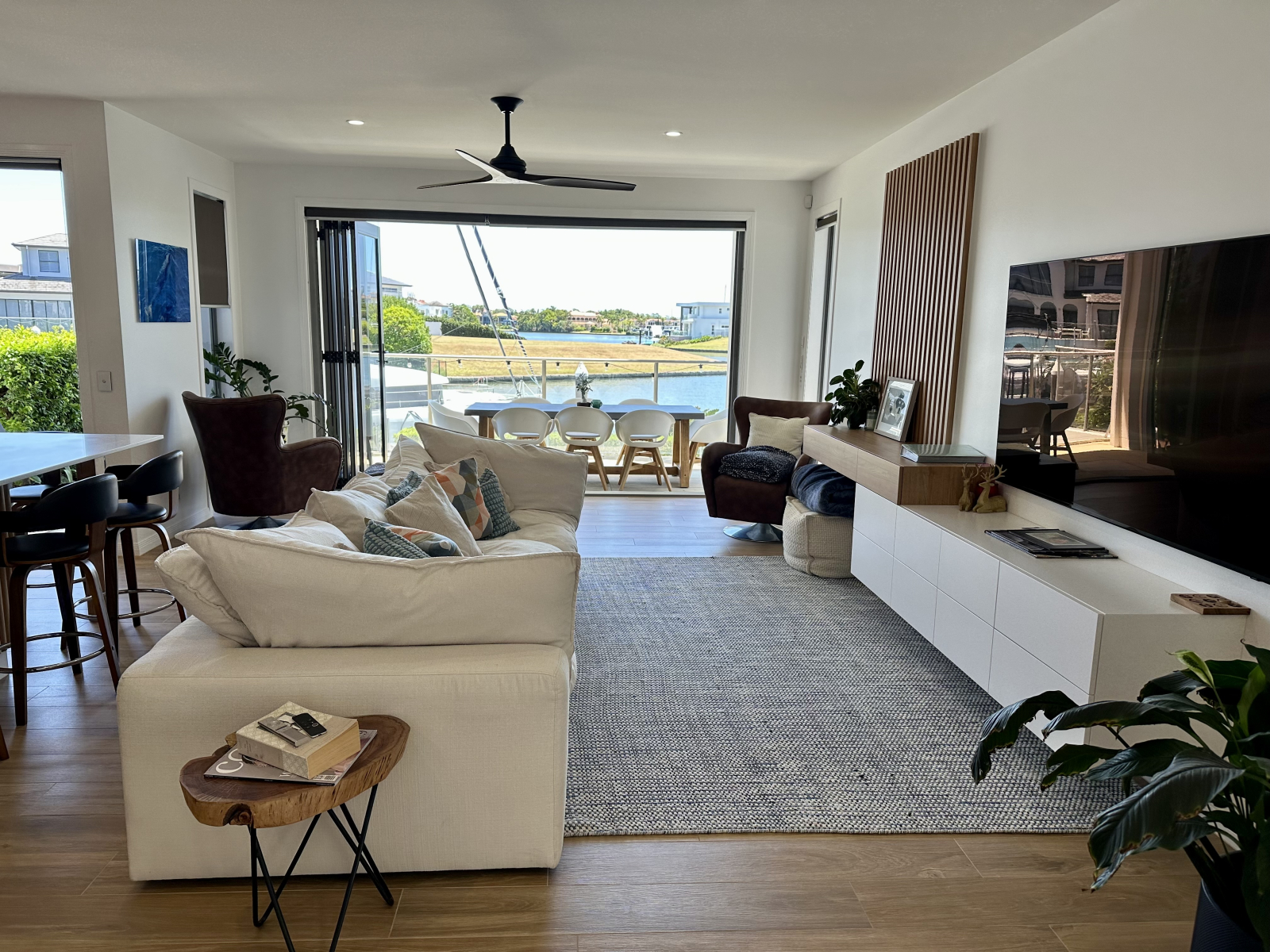 Modern waterfront home in a secure golfing estate.