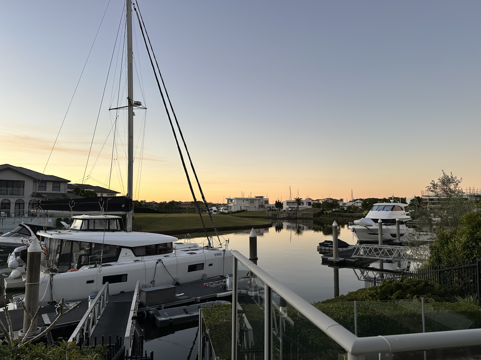 Modern waterfront home in a secure golfing estate.