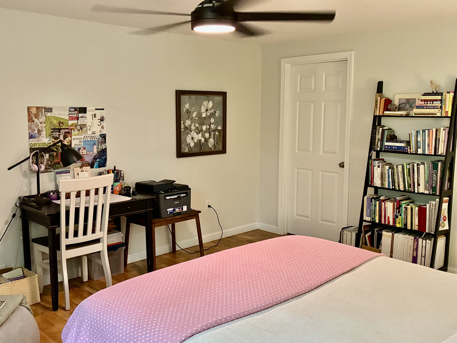 Second bedroom with desk, bookcase, and printer.