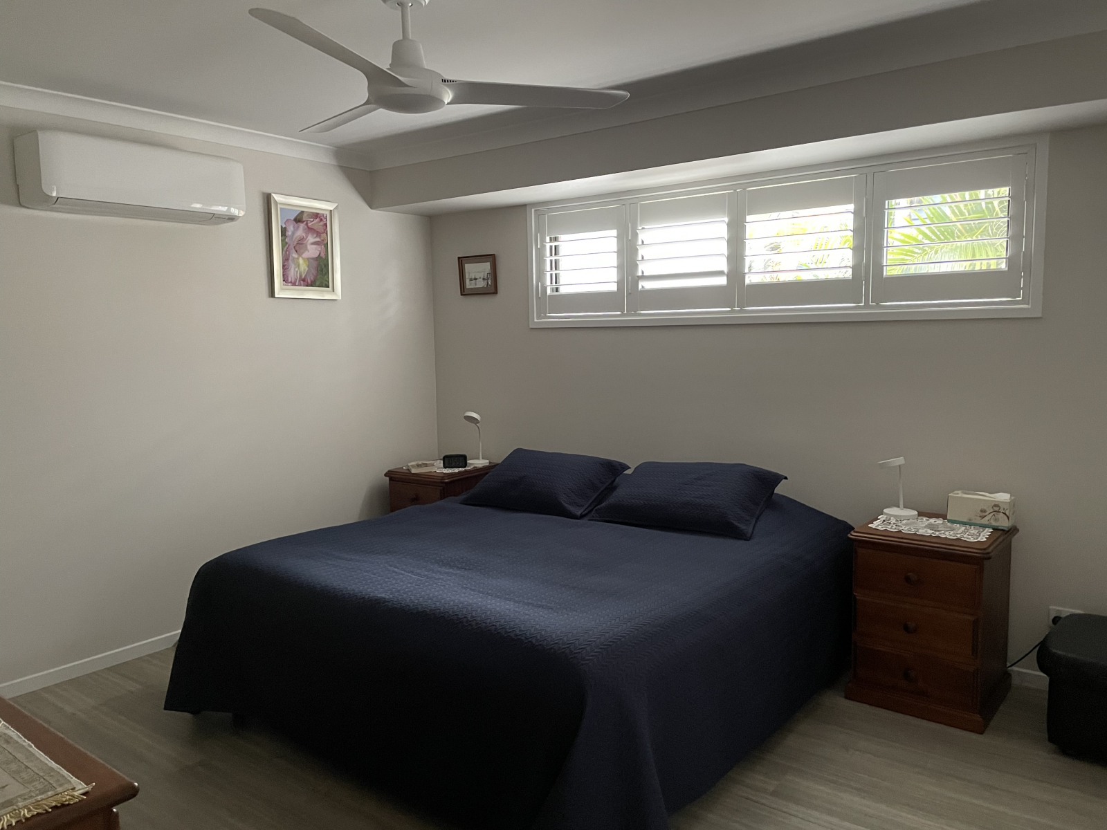 Main bedroom with adjustable KS bed, air conditioning,TV, walk-in robe and ensuite.