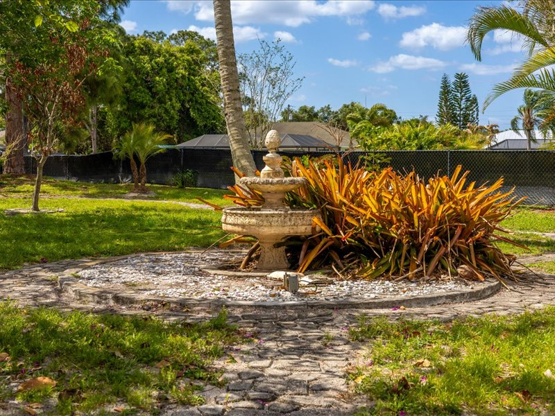 Heated pool house with garden yard on the canal