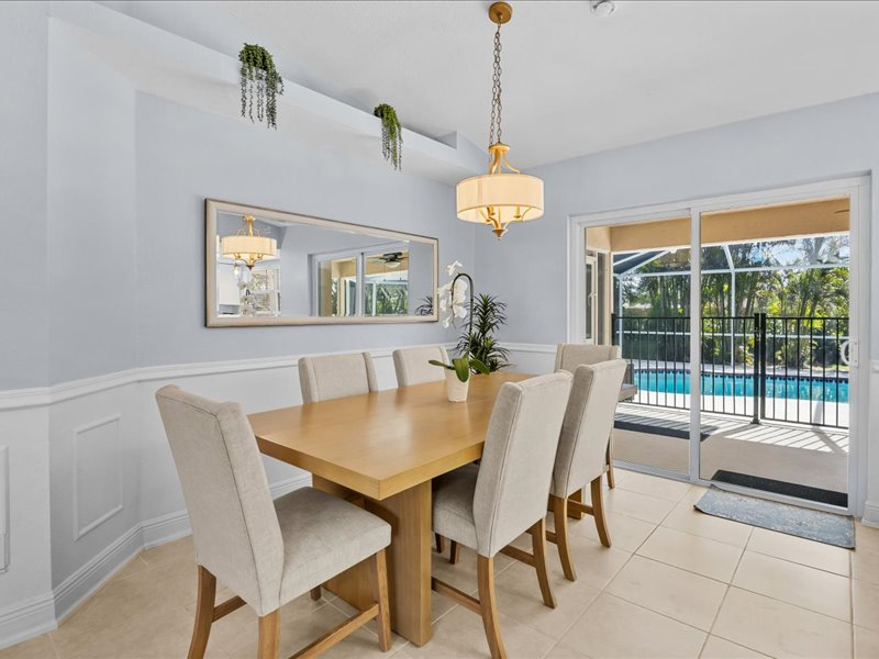 Heated pool house with garden yard on the canal