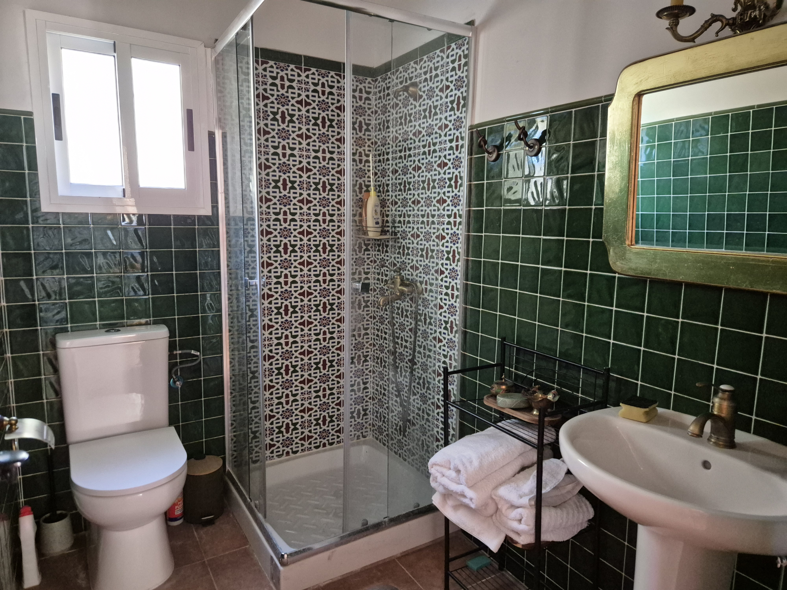 Bathroom with shower with traditional Andalusian tiles
