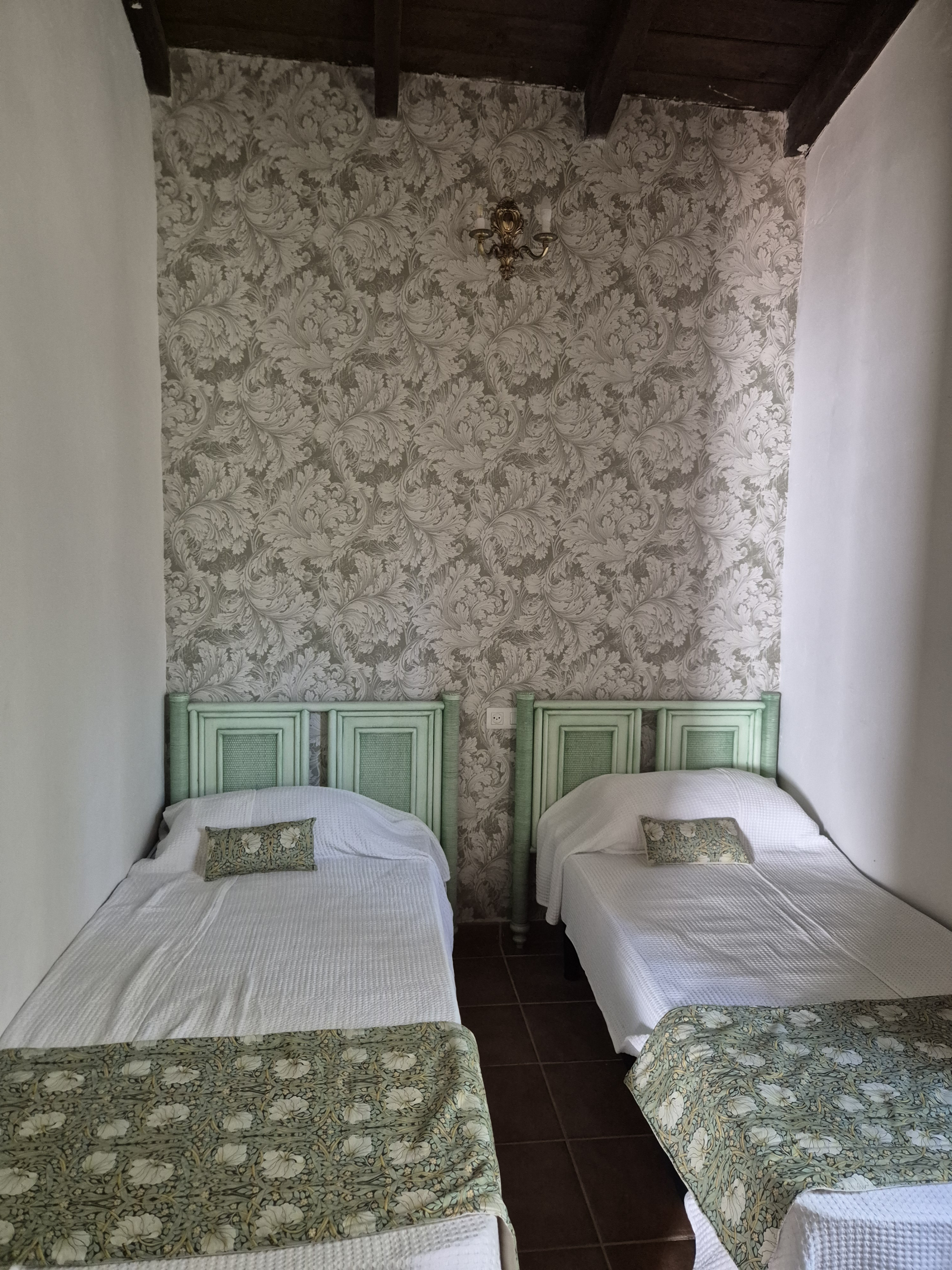 Second bedroom with two single beds and built in closets