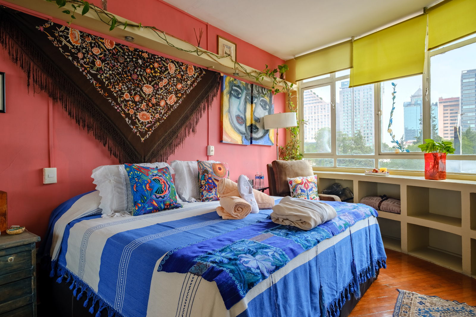 Relax in our King Size oasis with private bathroom and terrace access. Comes equipped with a compact closet and custom shelving so you can unpack your folded clothes and feel right at home.