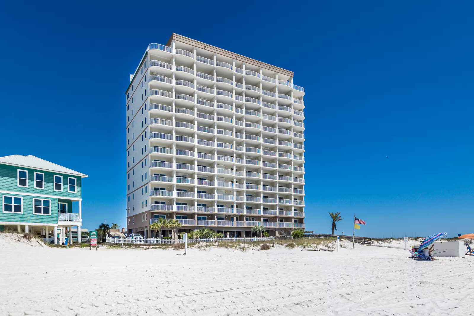 Direct Beachfront • Massive Balcony • Pool & Spa