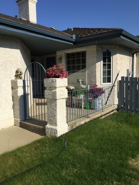 Bungalow facing Whitemud Creek ravine.