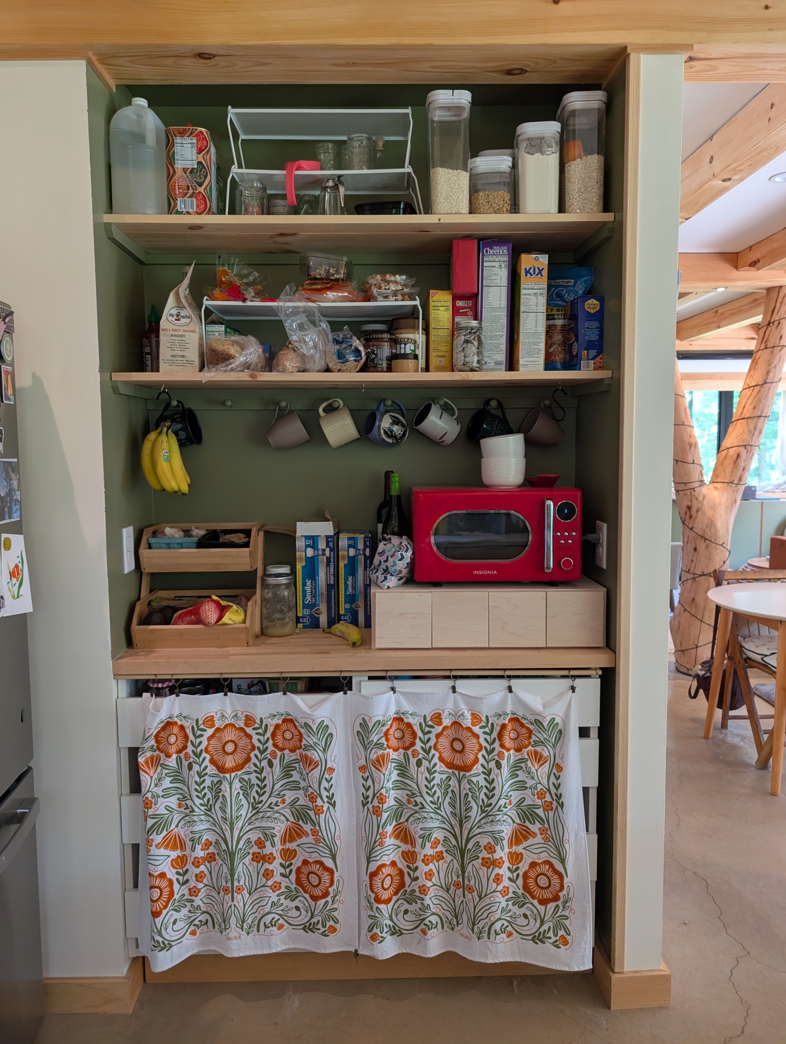 Pantry and living room, with our cherry tree forked support in the background