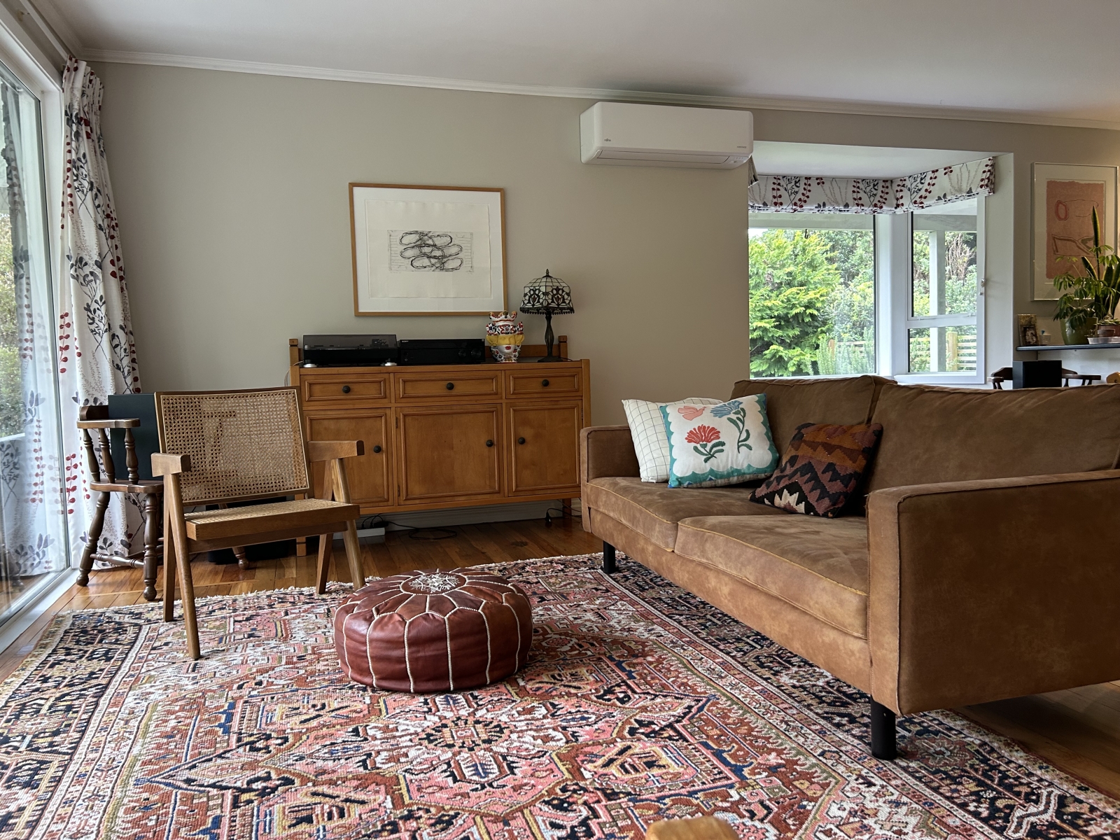 Living area next to dining and kitchen