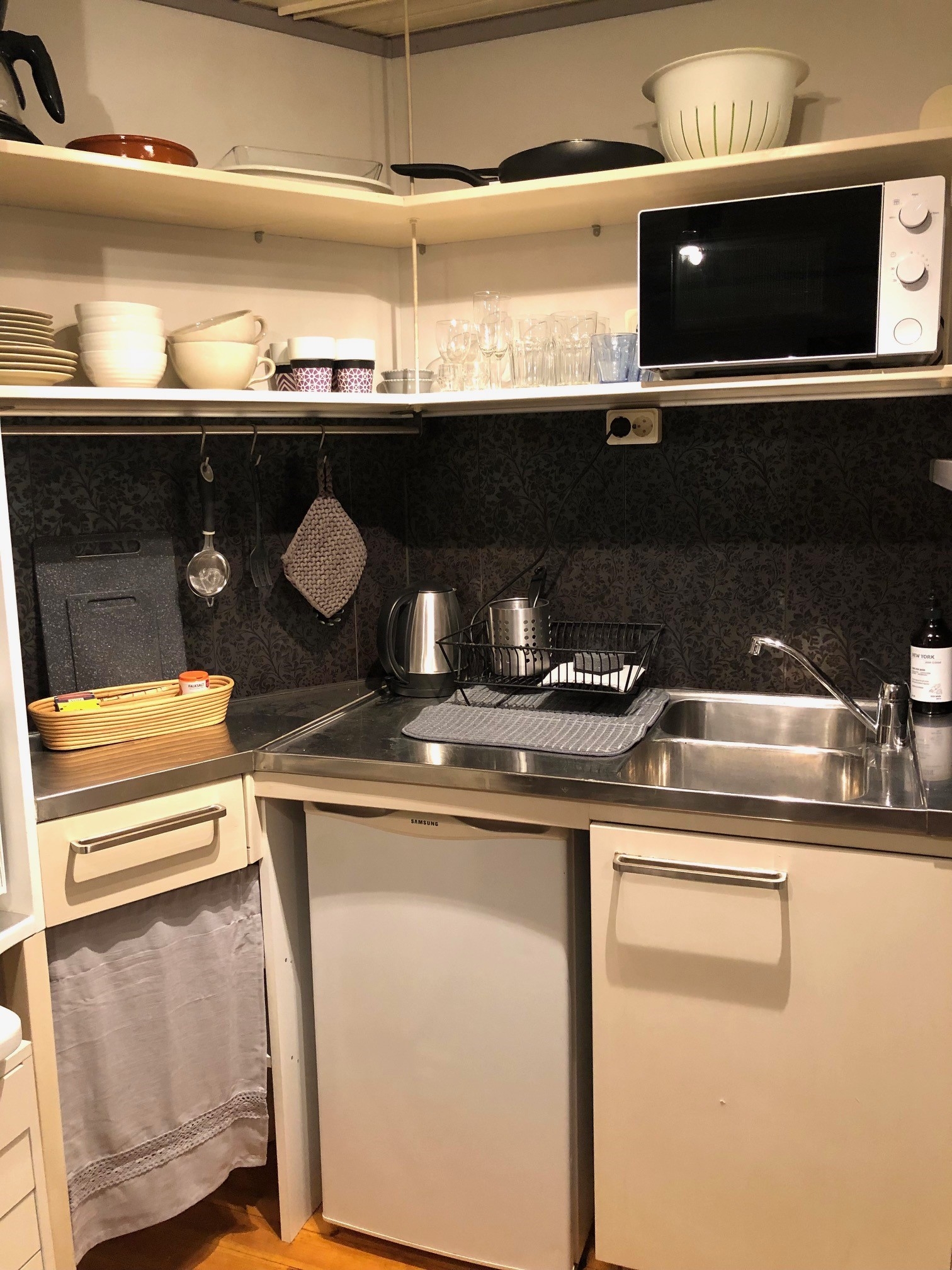 Klein studiohuisje met open haard