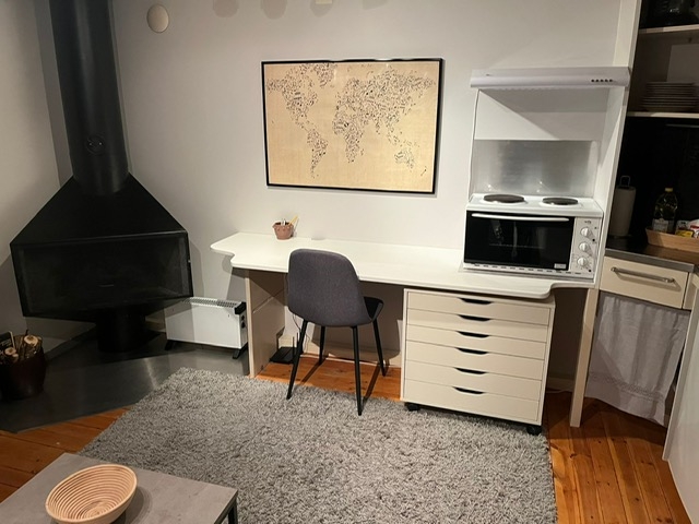 Klein studiohuisje met open haard