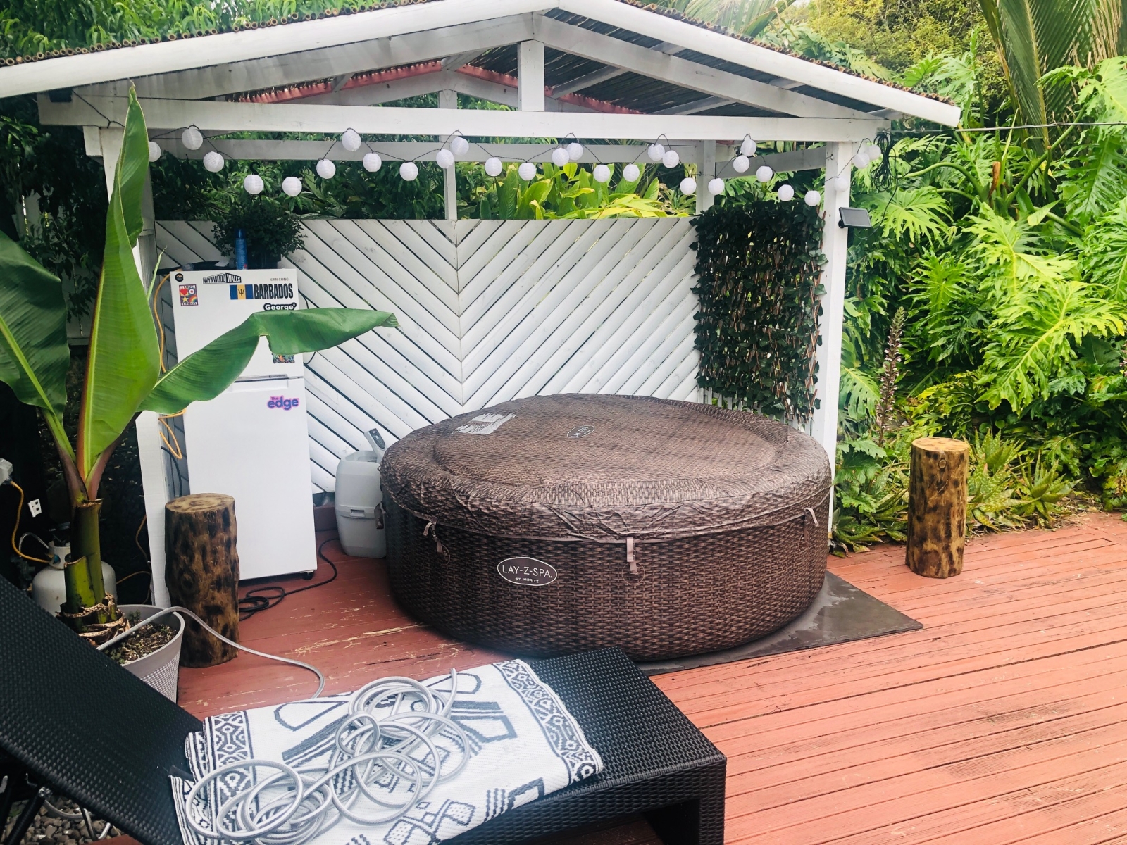 Back deck with hot tub and two loungers