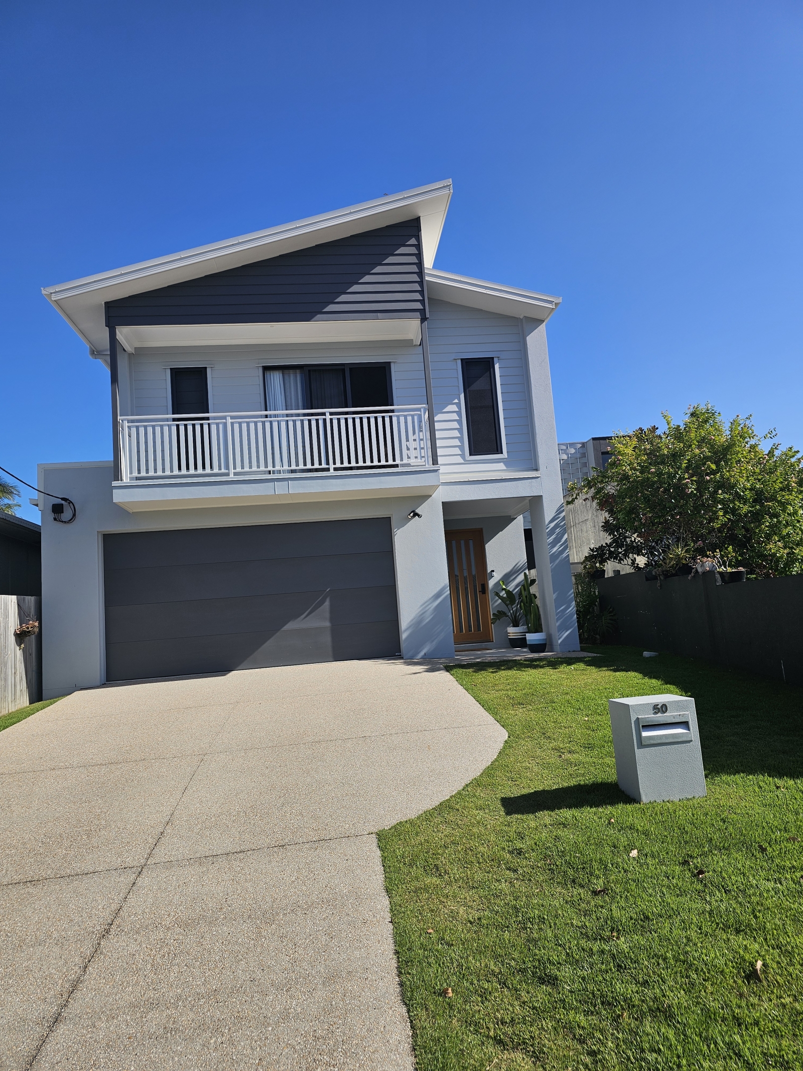 Modern family home walking distance to one of the Sunshine Coasts best family friendly beaches.