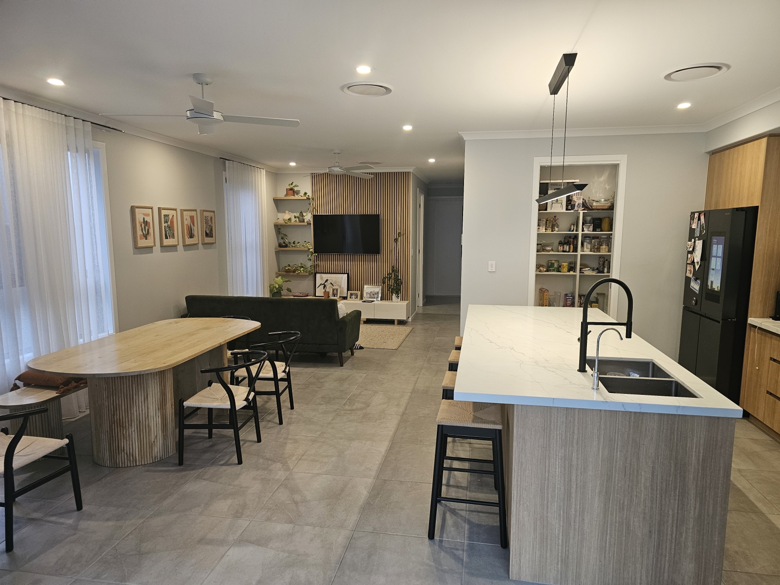 Modern family home walking distance to one of the Sunshine Coasts best family friendly beaches.