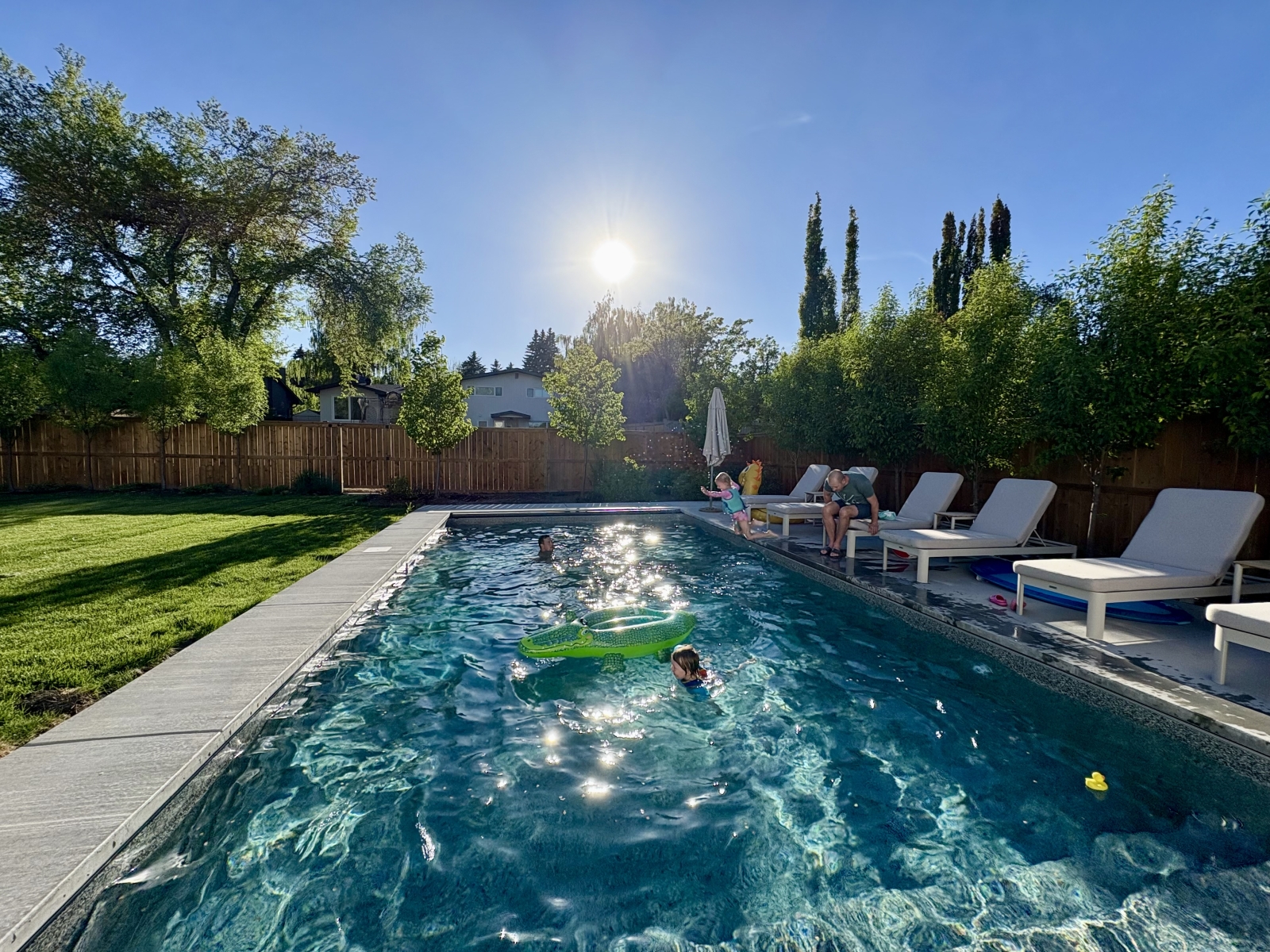 Inner-city renovated home with heated pool and sauna!