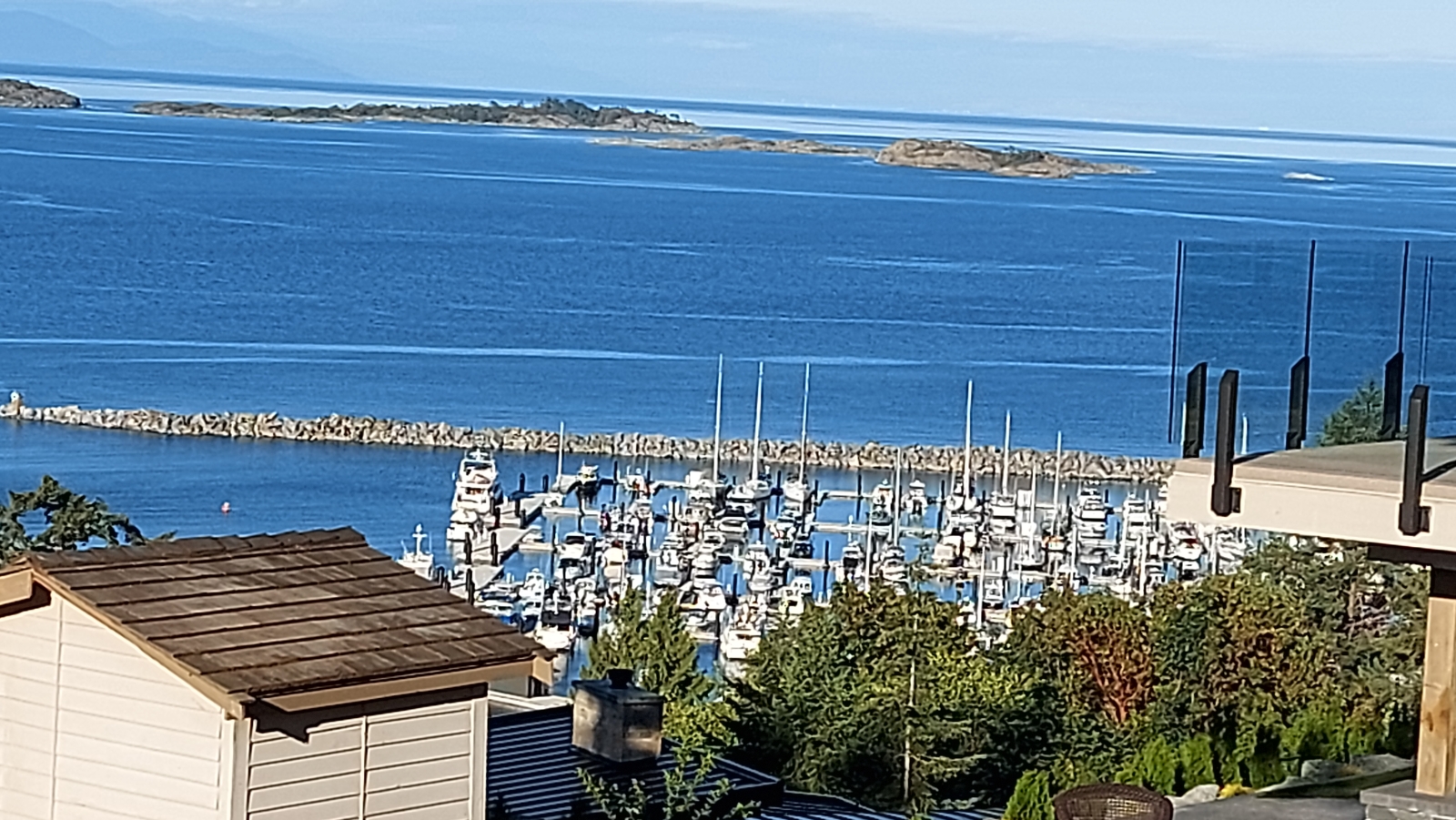 Relax with an ocean view and watch the eagles fly while sitting  on a beautiful sundrench deck.