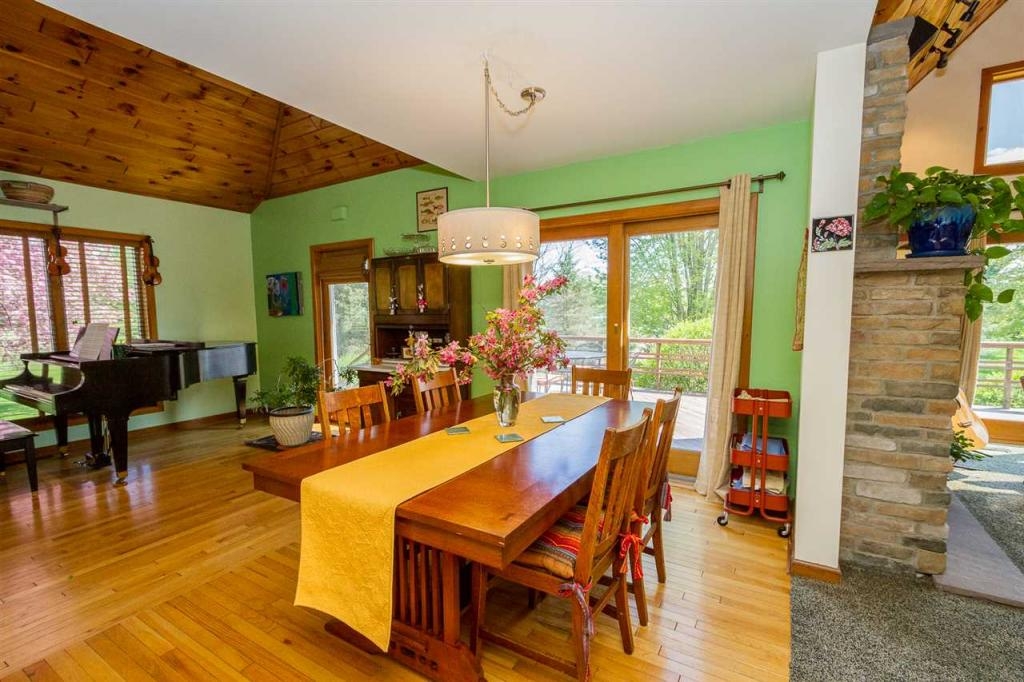 Sunny house with large deck on 2 acres, minutes from Saratoga Springs