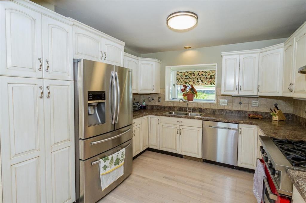 Sunny house with large deck on 2 acres, minutes from Saratoga Springs