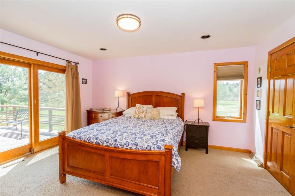 Sunny house with large deck on 2 acres, minutes from Saratoga Springs