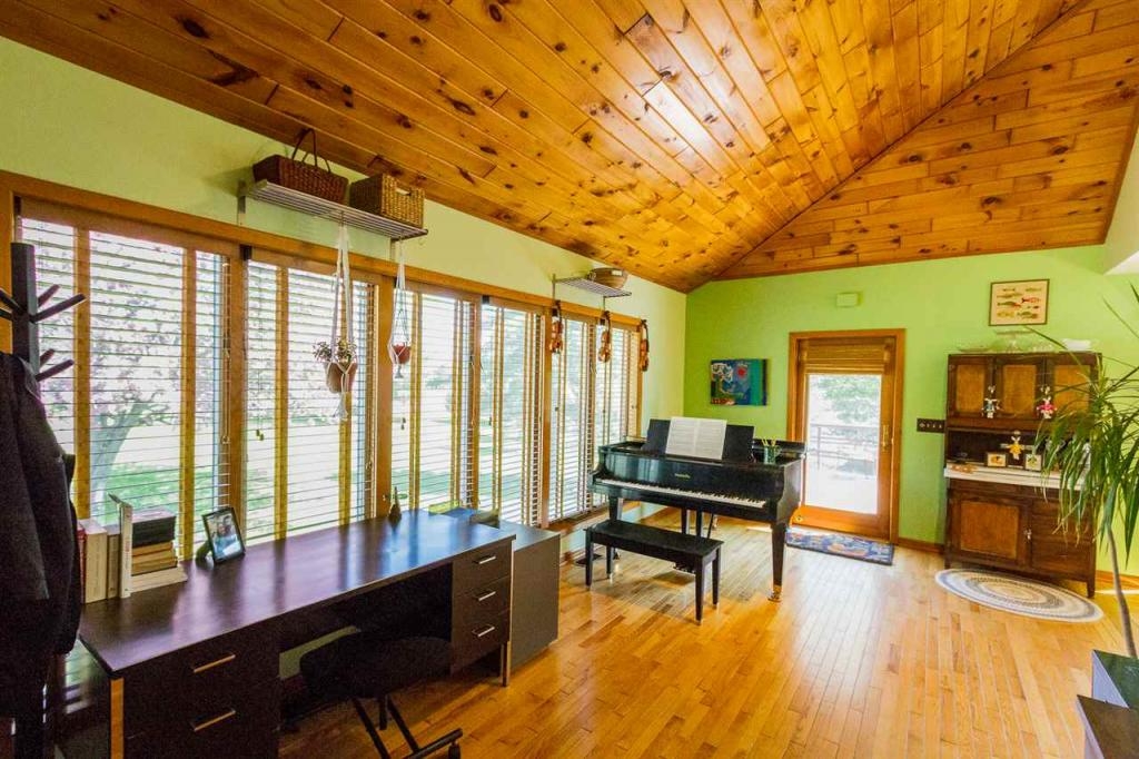 Sunny house with large deck on 2 acres, minutes from Saratoga Springs