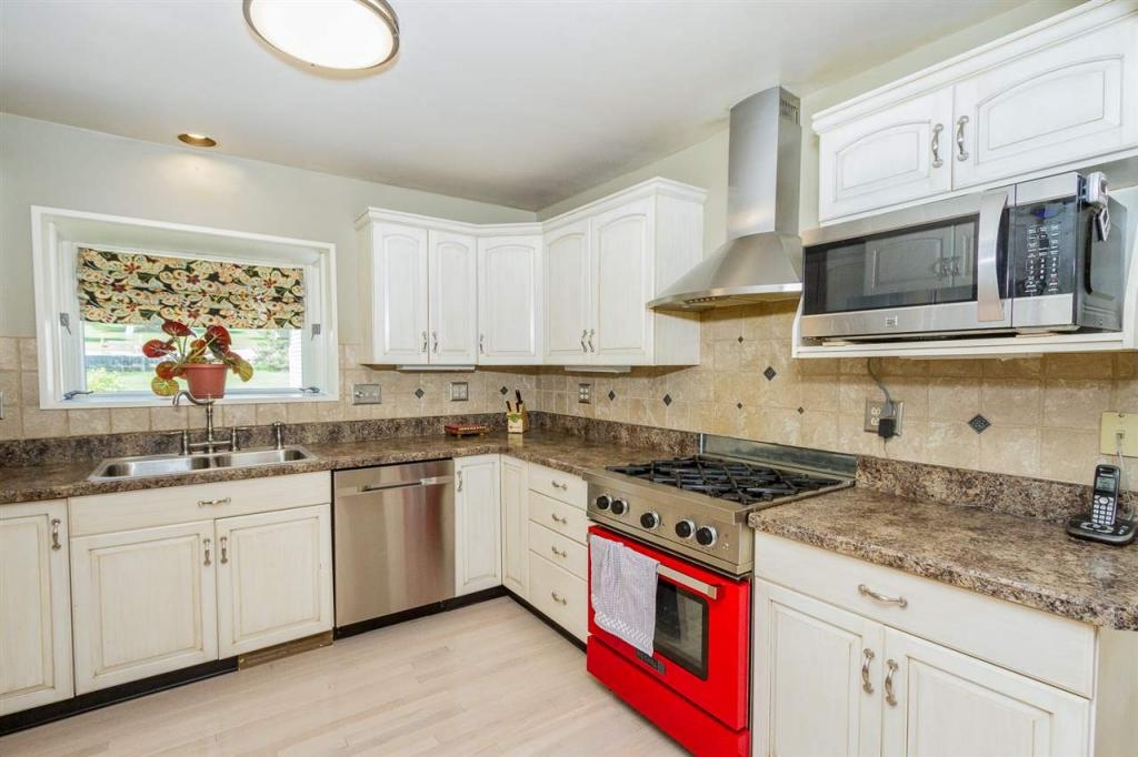 Sunny house with large deck on 2 acres, minutes from Saratoga Springs