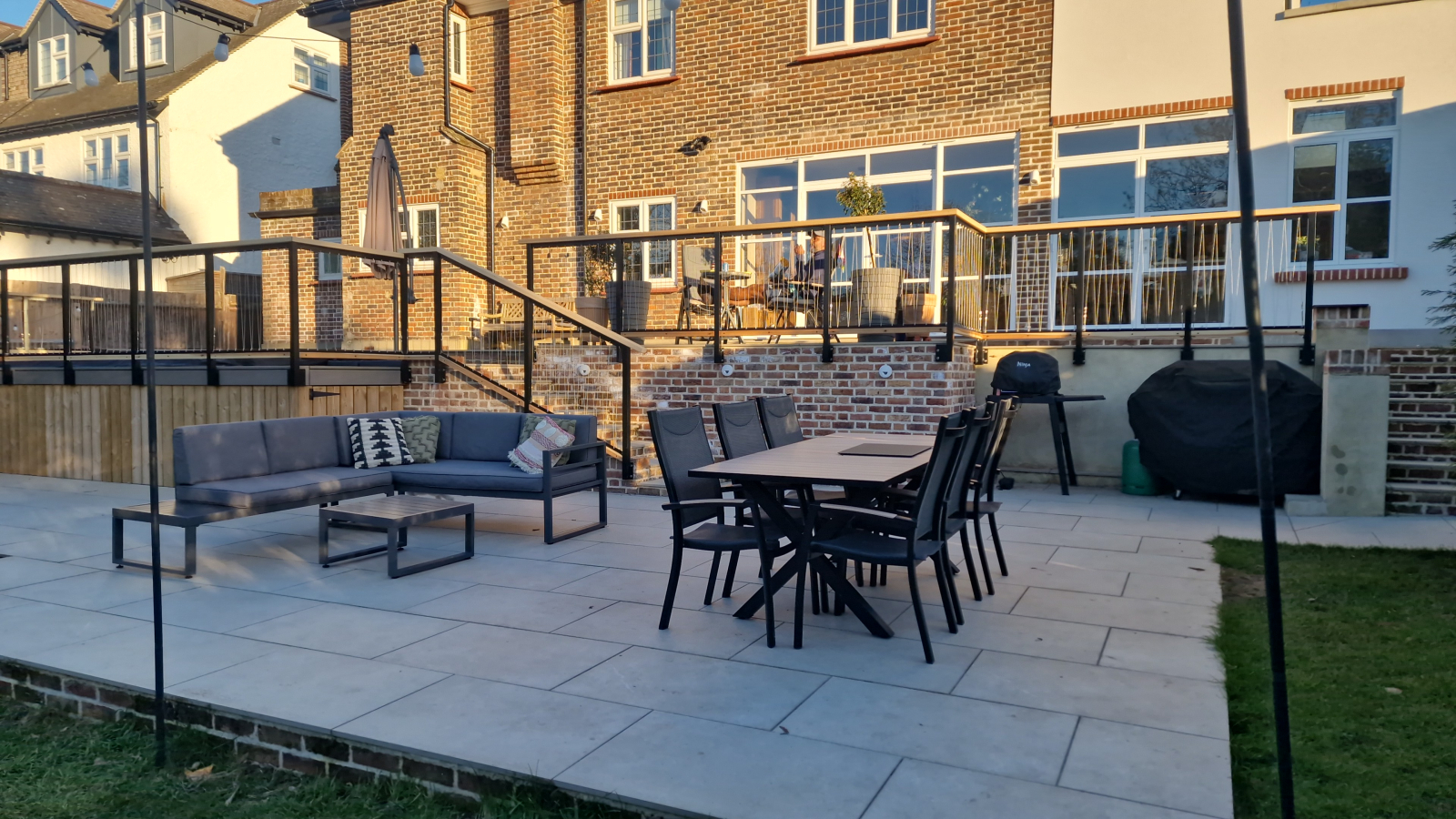Patio with gas bbq and Ninja smoker. This was taken early evening. Patio is in the sun most of the day