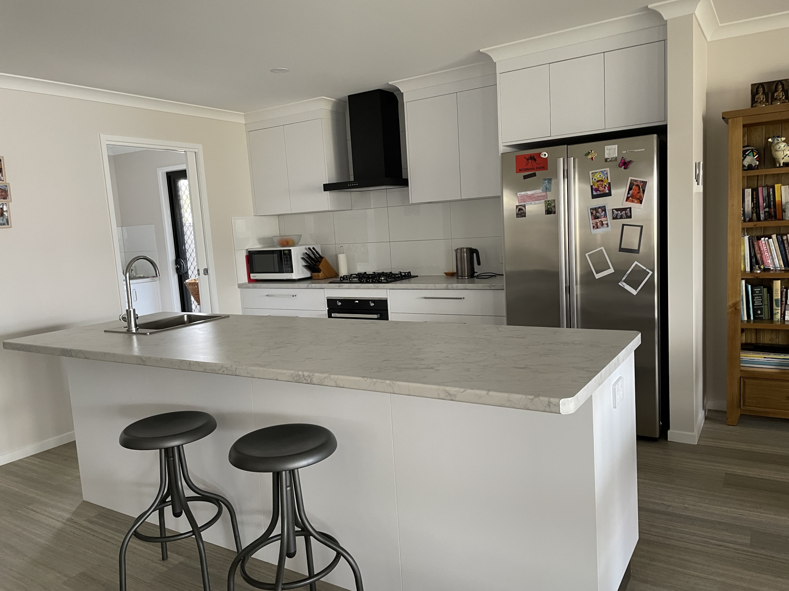 Kitchen with sliding door to Butler’s Pantry/Laundry