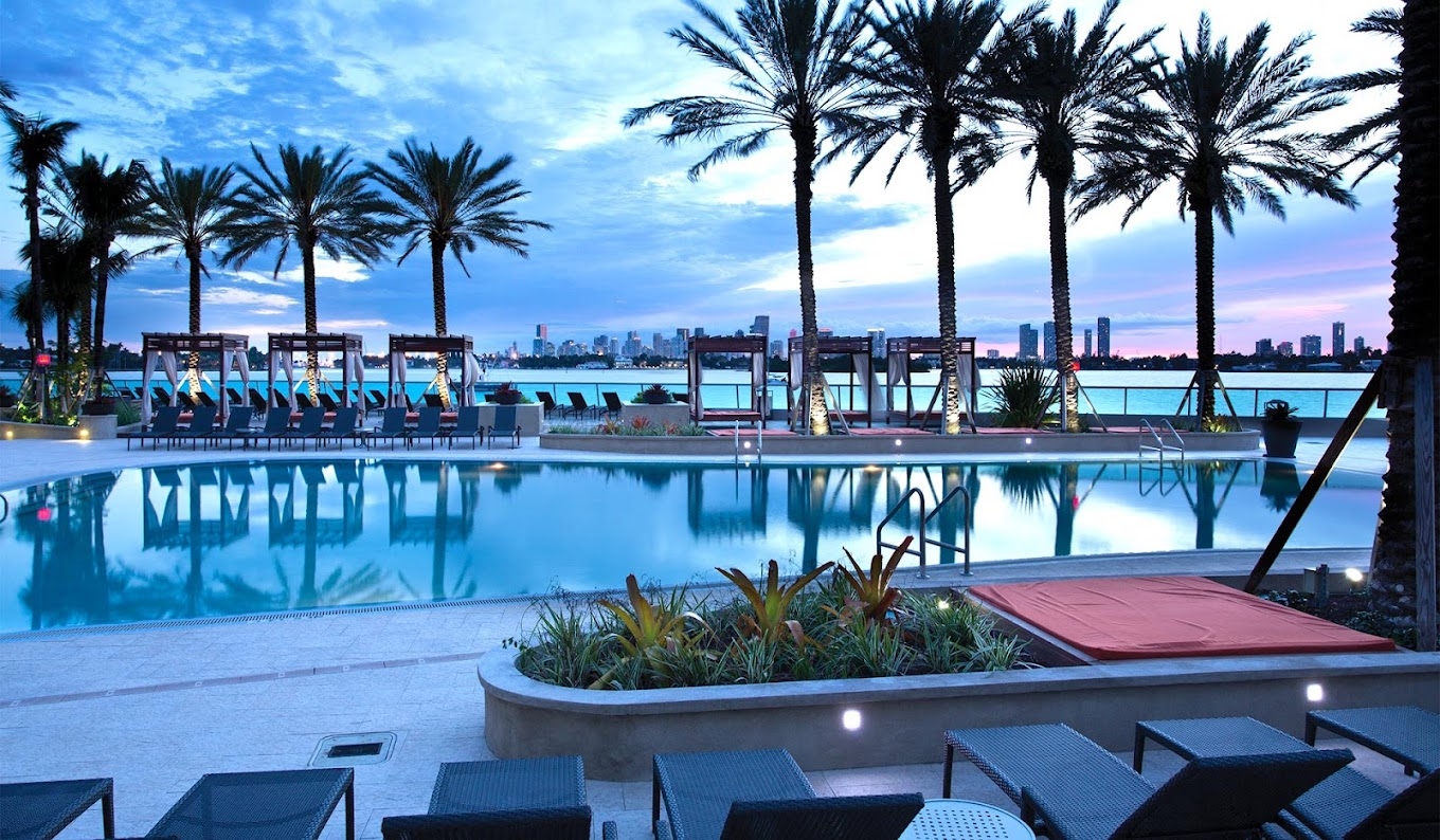 Sunny Artist’s Home in South Beach · Sunrise Balcony & Waterfront Pools