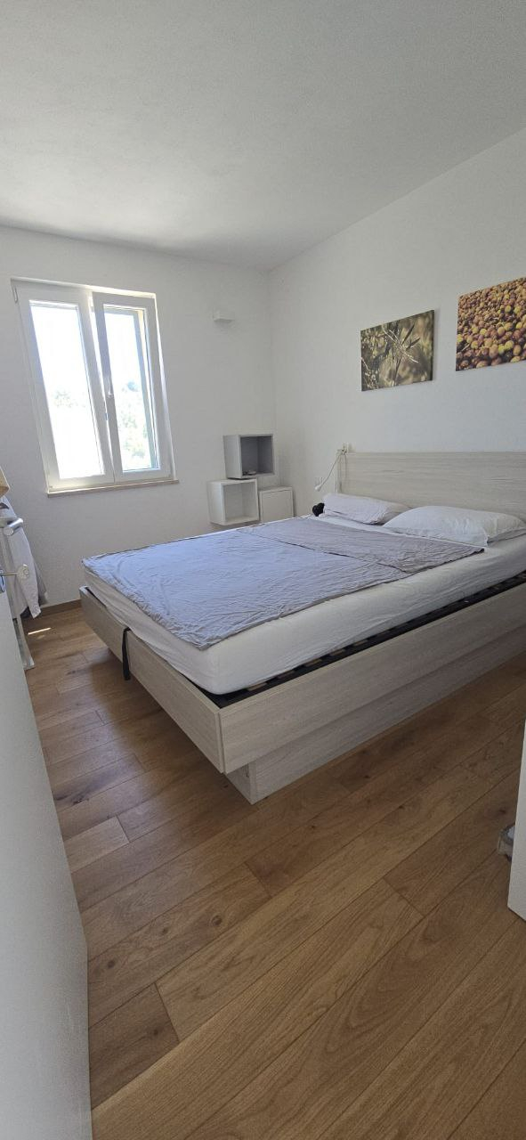 1st bedroom. Double size bed, wardrobe is around the corner, not in the picture.