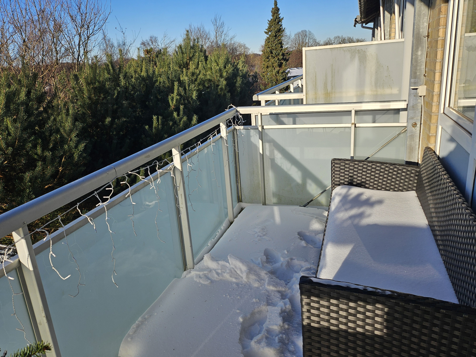 Balcony with snow in the winter season. 
The summer season makes it the perfect place for a glass o ...