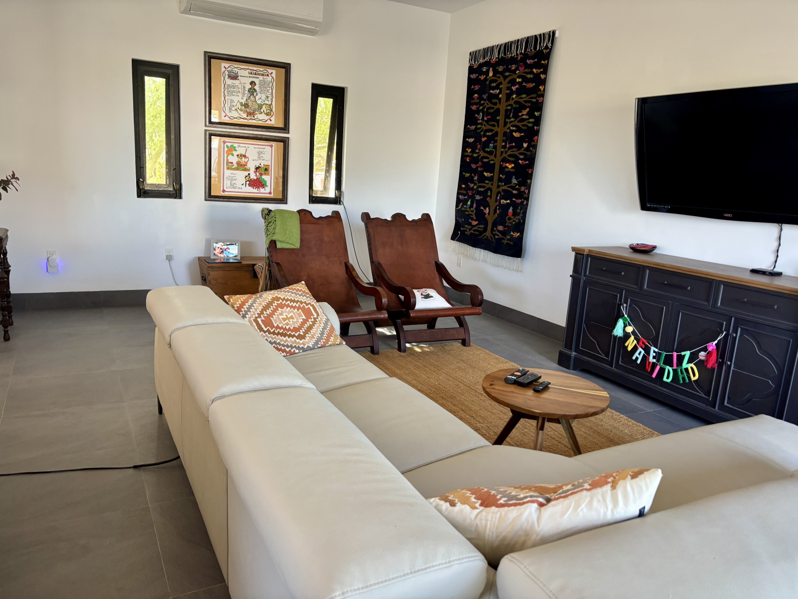 Indoor living space, TV has US broadcasting through YouTube TV, plus VeeSee box with endless channel ...