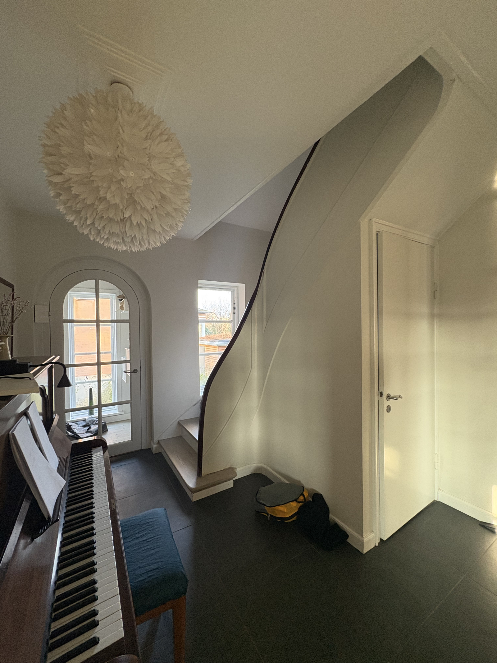 Hall - stairs to the 1. floor and door leading to the basement.